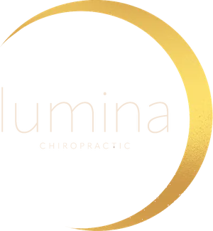 the lumina enclosed logo, a gold crescent around the lumina chiropractic wordmark