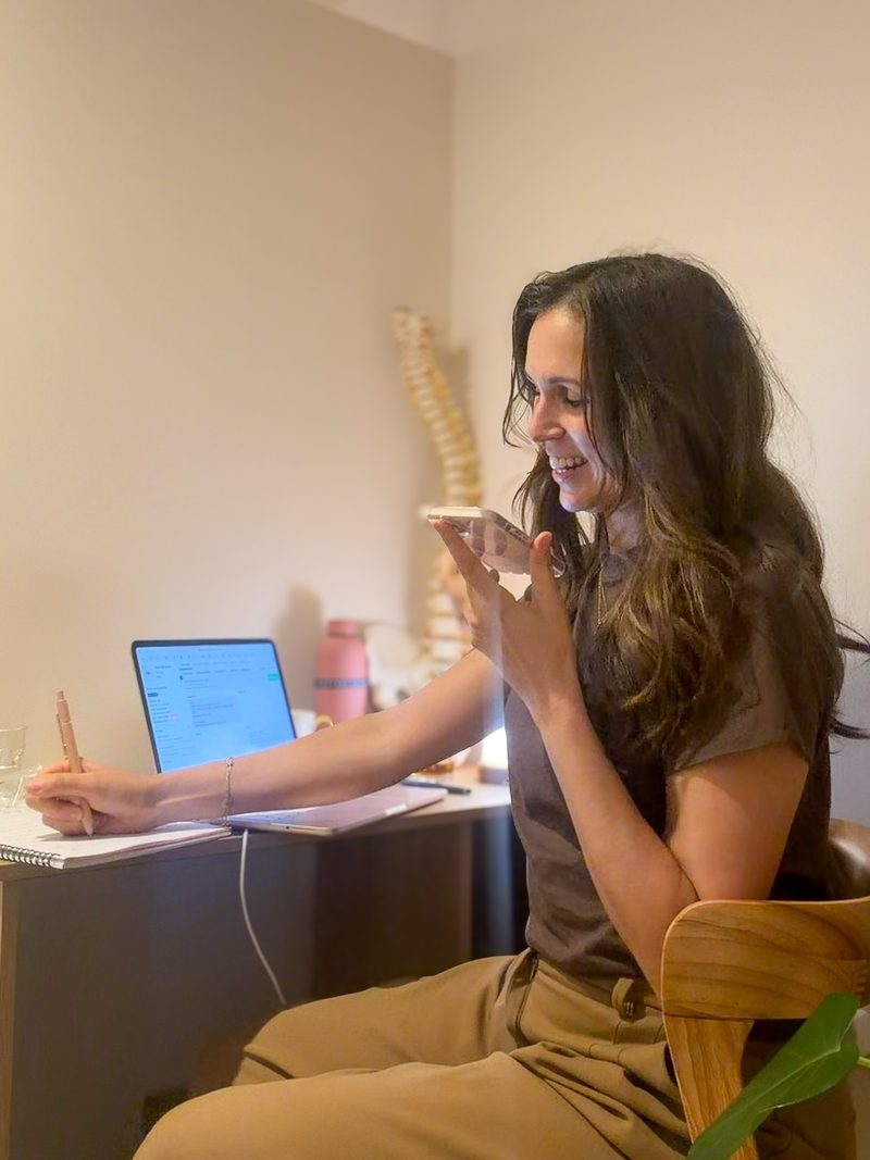 ruth on a phone consultation in the consult room